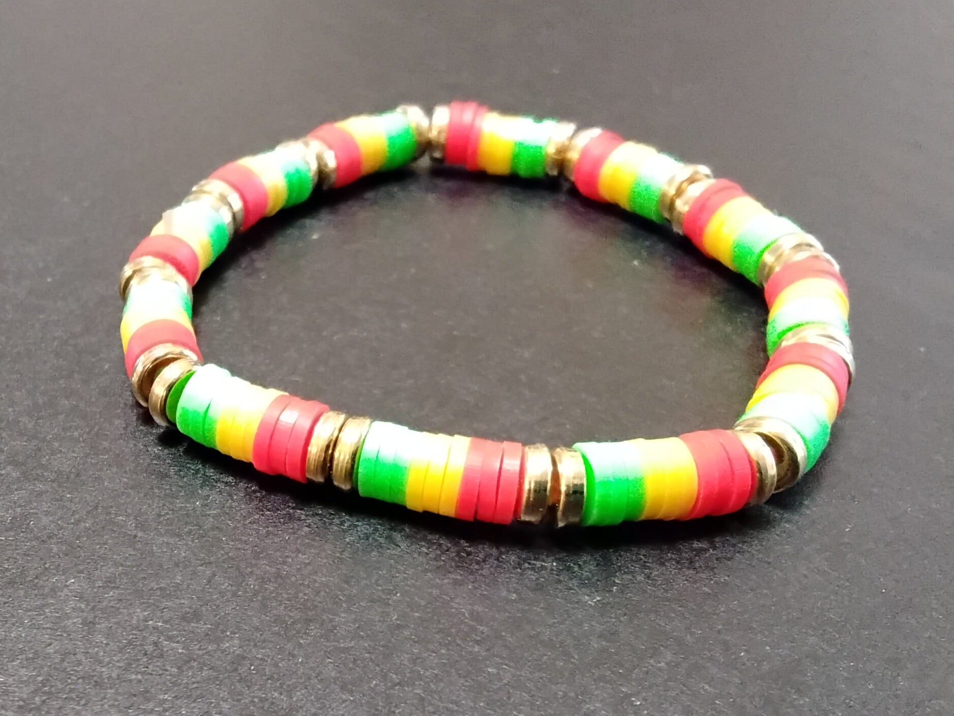 Rasta and gold beads with elastic band
